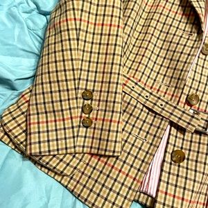 Super cute dress jacket. Tan with black,blue and red checks.